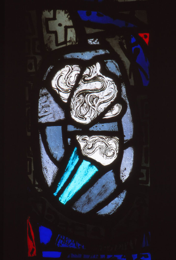 Abstract stained-glass design with swirling white shapes inside a blue and gray oval form, accented by bright blue and small red details.