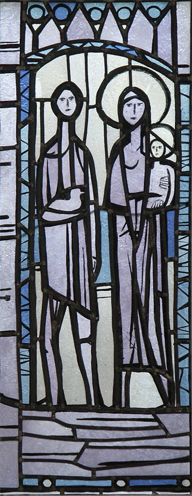 Stained-glass panel showing two haloed figures, one holding a child, framed by geometric arches and cool blue and purple tones.