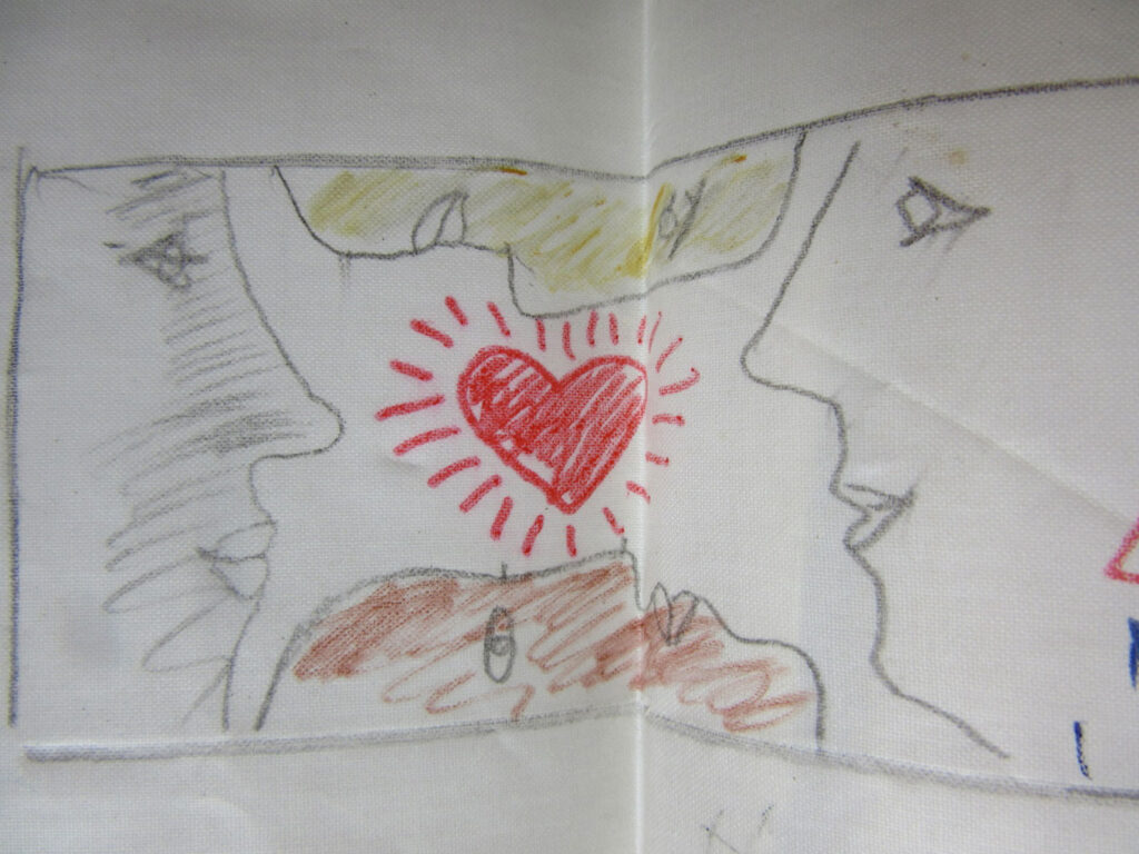 Hand-drawn faces on both sides of a bright red heart surrounded by rays, with a shaded figure below.